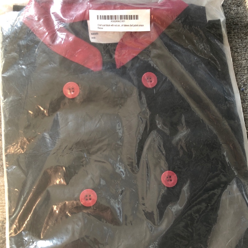 Size Large and 3XL red and black chef coats.